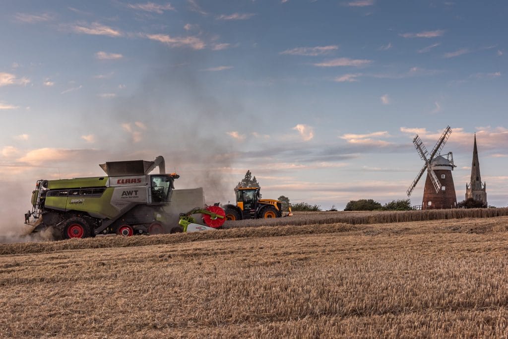 _DSC2429 Combine harvester, windmill and church