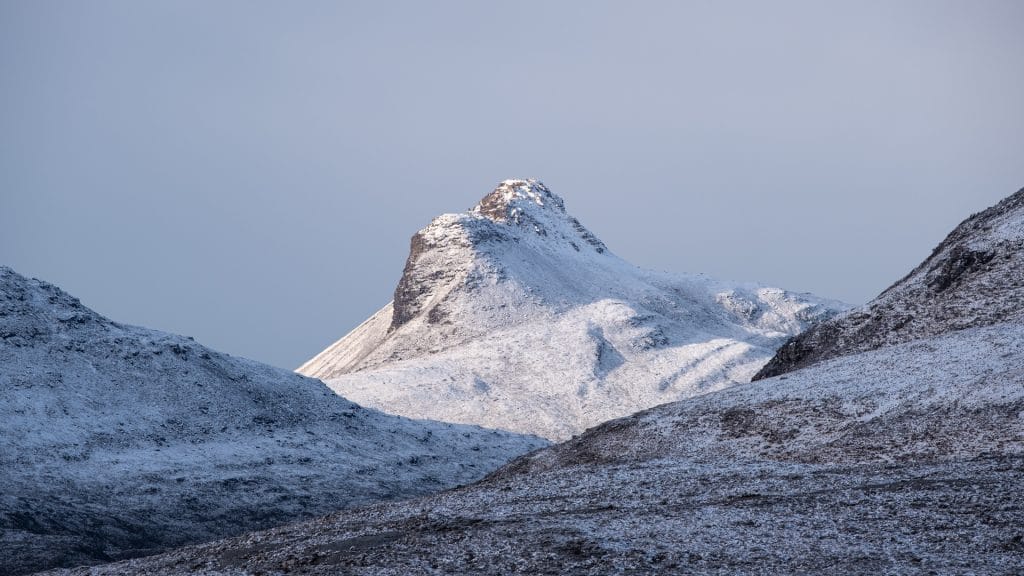 DSFF1478-2 Snowy mountain peak with blue sky background