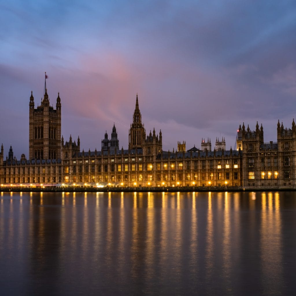 DSFF3457-3 Houses of Parliament illuminated at night, reflected in river Thames